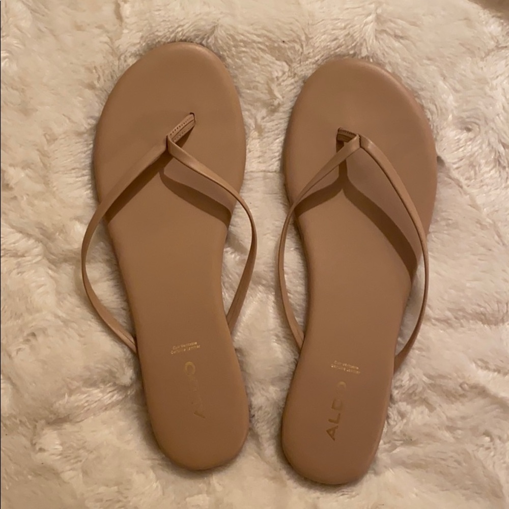 Never worn leather flip flops